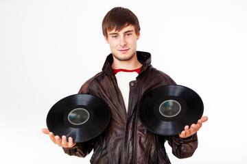 Man with acoustic LPs