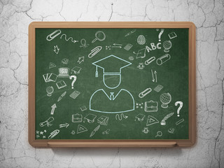 Fototapeta premium Education concept: Student on School Board background