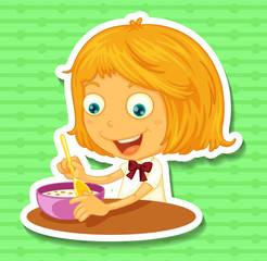 Little girl eating on the dining table