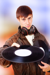 Man with acoustic LPs