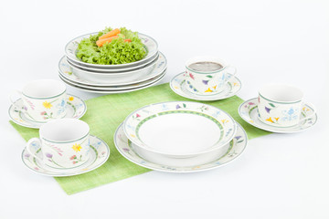 White modern dishes with figures flowers shapes