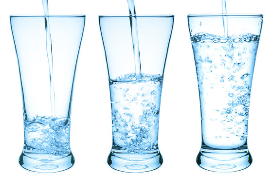 Pouring water in the glass with color filter effect on isolated background 5