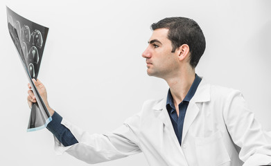 hospital doctor holding patient's x-ray film