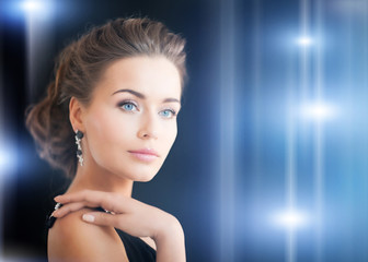 woman with diamond earrings