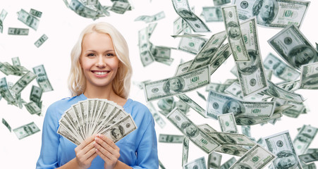 smiling businesswoman with dollar cash money