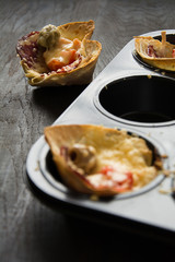 Mini pizza on dark background