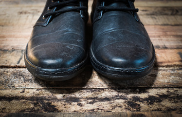 black shoes on wood