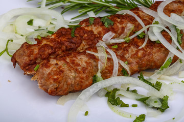 Kebab with onion rings