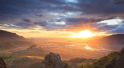 Obraz premium Tranquil and cloudy sunrise on mountaintop Valahnùkur in Pórsmörk, Iceland.