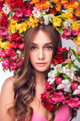 Obraz na płótnie Canvas Girl with bright flowers