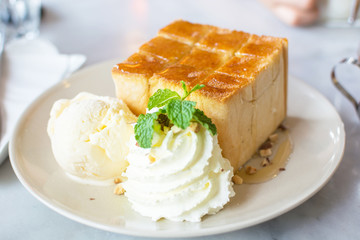 french toast with ice cream and almond.Honey toast with ice crea