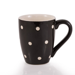 black cup with white dot