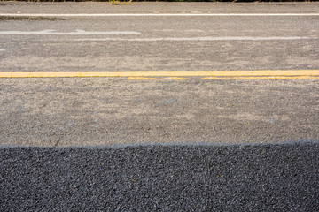 new and old asphalt road