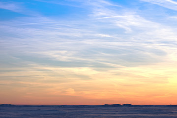 Bright colorful sky over the snowy desert
