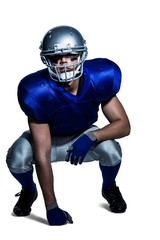 American football player in uniform crouching © WavebreakmediaMicro