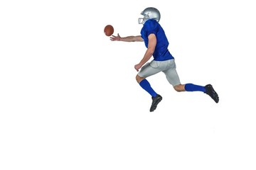 Fototapeta na wymiar American football player trying to catch the ball