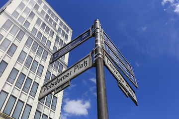 Street signs at the Potsdamer Platz in Berlin, Germany - 90999934