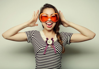 young woman with big party glasses