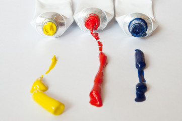 Paint tubes of primary colors