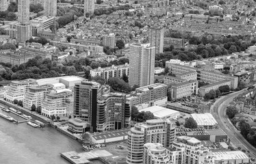 Fototapeta na wymiar Helicopter view of London with buildings and river Thames