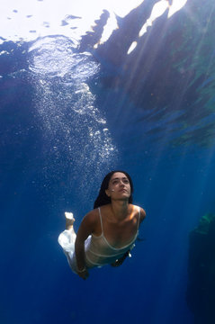 a beautiful girl underwater