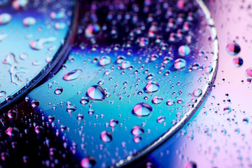 Water drops on cd, close up