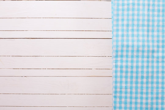 Blue Kitchen Towel  On White Wooden Background.