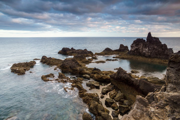 Volcanic rocks rising from the ocean
