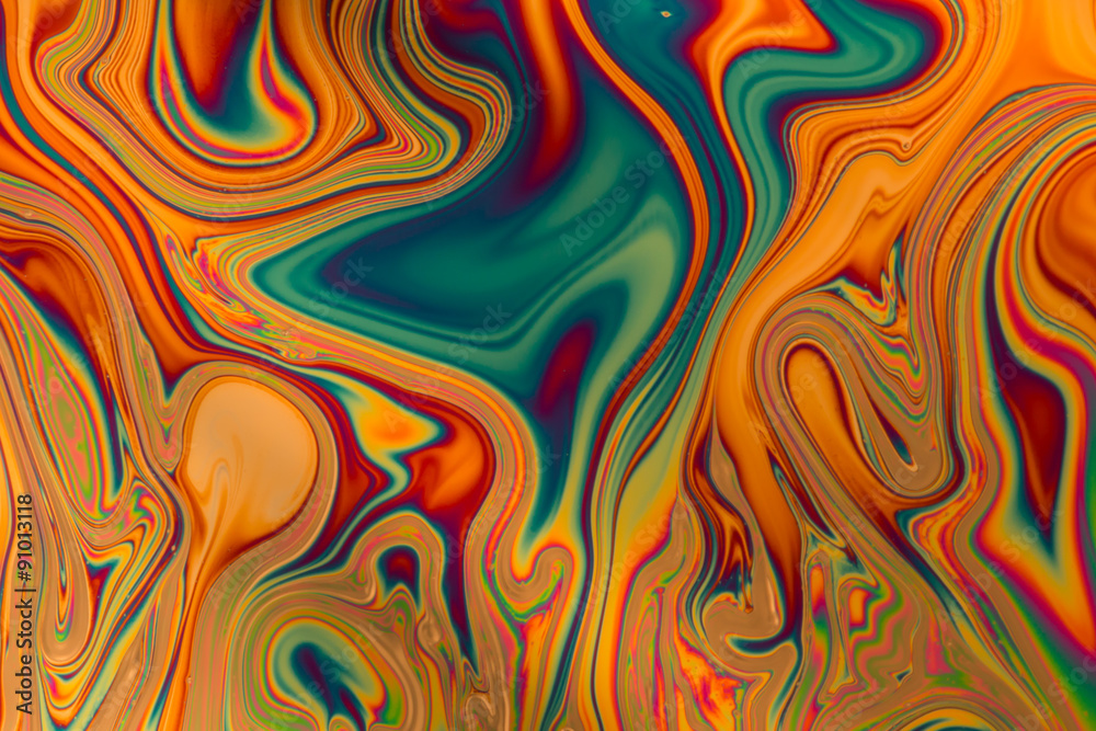 Wall mural Multicolored soap bubble abstract background formed by light reflecting off the surface of a soap film