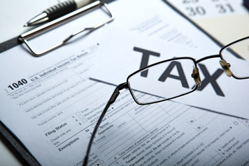 filling tax return on desktop