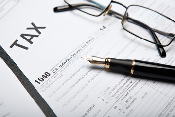 filling tax return on desktop