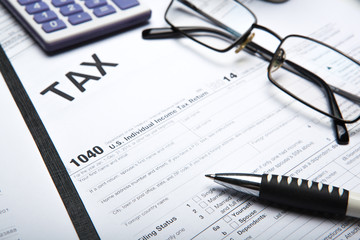 filling tax return on desktop