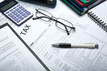 filling tax return on desktop