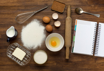 baking background with eggshell and rolling pin