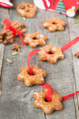 Honey cakes with spices on a wooden background. Christmas compos