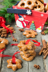 Fototapeta premium Honey cakes with spices on a wooden background. Christmas compos