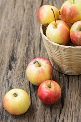 Apples on brown wooden background