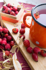 Rosehip tea tea on wooden table