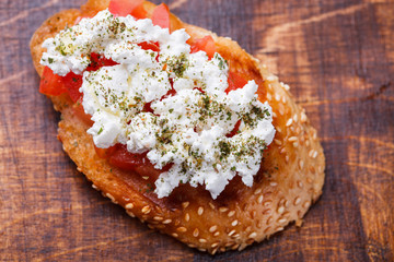 Bruschetta with tomato and feta cheese. selective focus