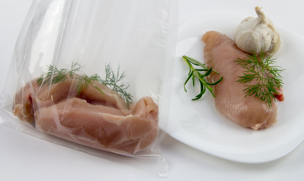 Fresh chicken breast  inside bag; soue vide - cooking under vacuum