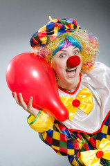 Obraz na płótnie Canvas Clown with balloons in funny concept