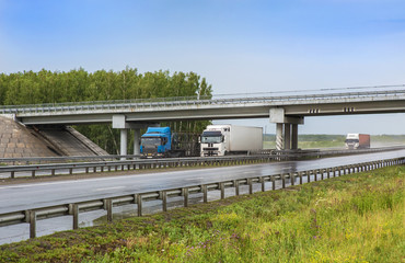 trailers go on highway to rain