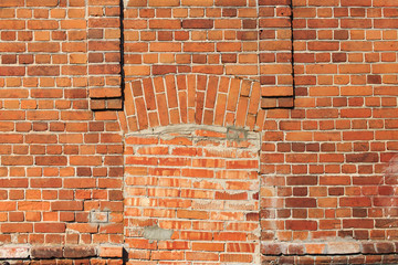 sealed entrance bricks. Bricked up doorway in an old brick wall, immured the entrance