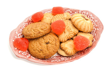 cookies and fruit candy on a plate