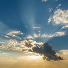 Beautiful blue sky with clouds and sun rays