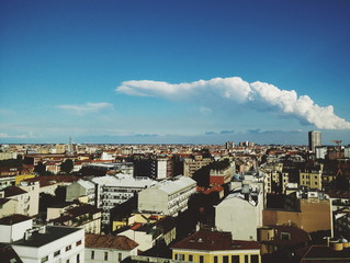 Obraz premium Milan Skyline with stormy clouds at horizon