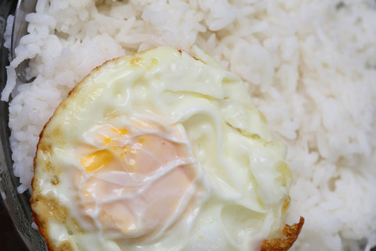 rice and fried eggs of easy breakfast cooking