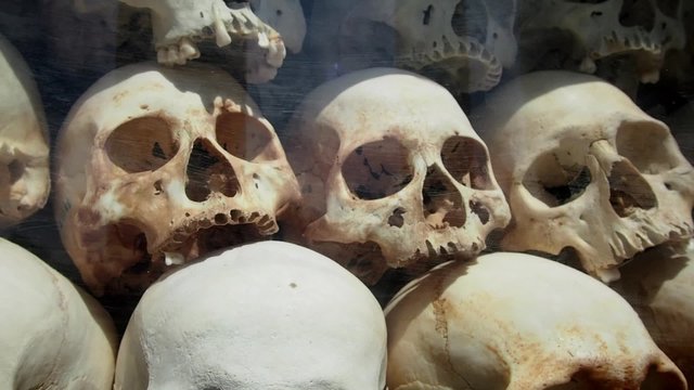 Skulls of victims of the Khmer Rouge at the Killing Fields of Choeung Ek in Phnom Penh, Cambodia.
