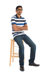 Naklejka premium young indian male sitting