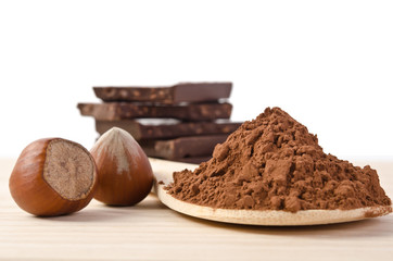 the tower from chocolate with nuts  and cacao powder in the wood